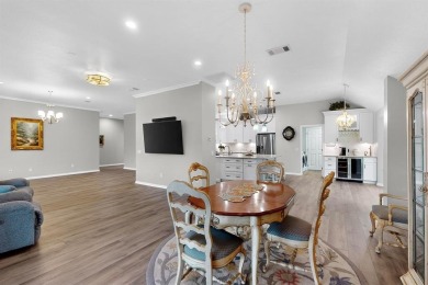 Welcome to this stunning stucco and stone Trova, beautifully on Wildhorse Golf Club of Robson Ranch in Texas - for sale on GolfHomes.com, golf home, golf lot