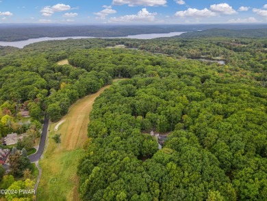 Come enjoy lake life in this elegant Cape cod 3 bedroom 2.5 bath on Paupack Hills Golf and Country Club in Pennsylvania - for sale on GolfHomes.com, golf home, golf lot