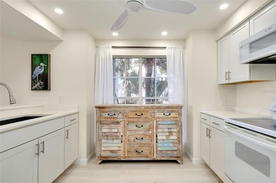 This recently renovated 2nd level end unit residence is light on Plantation Golf and Country Club in Florida - for sale on GolfHomes.com, golf home, golf lot