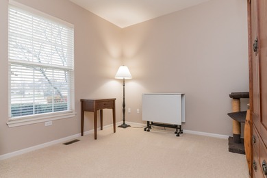 Welcome to this beautifully maintained 2-bedroom, 2-bath ranch on Whisper Creek Golf Club in Illinois - for sale on GolfHomes.com, golf home, golf lot