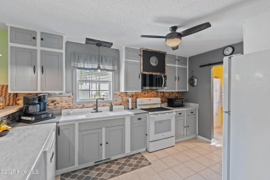 This meticulously maintained 3-bedroom, 2-bath ranch sits on a on The Lakes Country Club in North Carolina - for sale on GolfHomes.com, golf home, golf lot