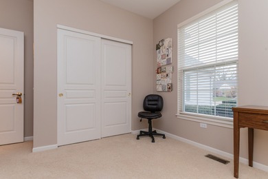 Welcome to this beautifully maintained 2-bedroom, 2-bath ranch on Whisper Creek Golf Club in Illinois - for sale on GolfHomes.com, golf home, golf lot