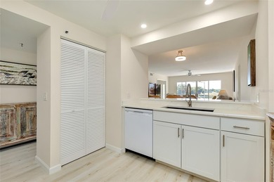 This recently renovated 2nd level end unit residence is light on Plantation Golf and Country Club in Florida - for sale on GolfHomes.com, golf home, golf lot