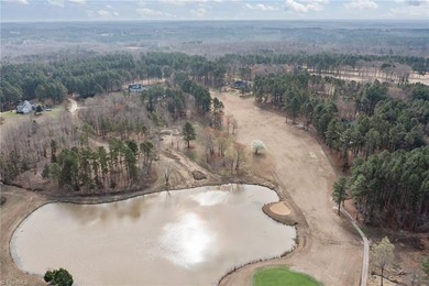 Build your dream home on this nearly one-acre lot located along on Caswell Pines Golf Club in North Carolina - for sale on GolfHomes.com, golf home, golf lot