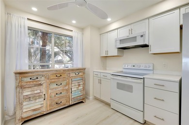 This recently renovated 2nd level end unit residence is light on Plantation Golf and Country Club in Florida - for sale on GolfHomes.com, golf home, golf lot