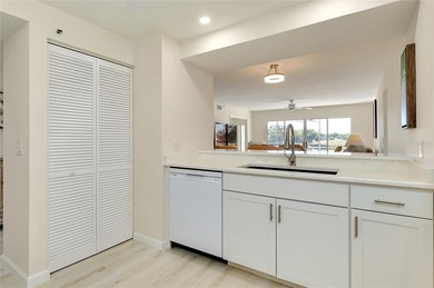 This recently renovated 2nd level end unit residence is light on Plantation Golf and Country Club in Florida - for sale on GolfHomes.com, golf home, golf lot