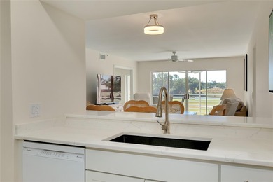 This recently renovated 2nd level end unit residence is light on Plantation Golf and Country Club in Florida - for sale on GolfHomes.com, golf home, golf lot
