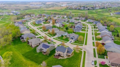 Welcome to this stunning two-story residence nestled in the on The Legacy Golf Club in Iowa - for sale on GolfHomes.com, golf home, golf lot