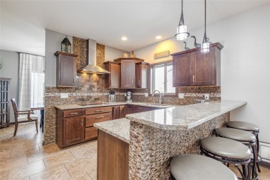 Welcome to this stunning two-story residence nestled in the on The Legacy Golf Club in Iowa - for sale on GolfHomes.com, golf home, golf lot