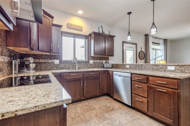 Welcome to this stunning two-story residence nestled in the on The Legacy Golf Club in Iowa - for sale on GolfHomes.com, golf home, golf lot
