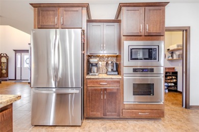 Welcome to this stunning two-story residence nestled in the on The Legacy Golf Club in Iowa - for sale on GolfHomes.com, golf home, golf lot