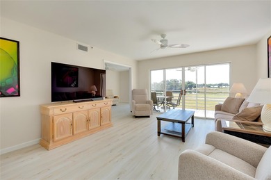 This recently renovated 2nd level end unit residence is light on Plantation Golf and Country Club in Florida - for sale on GolfHomes.com, golf home, golf lot
