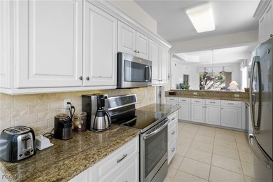 2 bedroom + den, top floor end unit with golf membership in on Legends Golf and Country Club in Florida - for sale on GolfHomes.com, golf home, golf lot