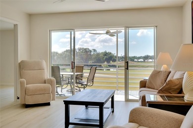 This recently renovated 2nd level end unit residence is light on Plantation Golf and Country Club in Florida - for sale on GolfHomes.com, golf home, golf lot