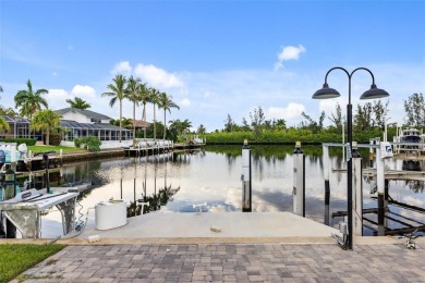 Under contract-accepting backup offers. Welcome to a stunning on Twin Isles Country Club in Florida - for sale on GolfHomes.com, golf home, golf lot