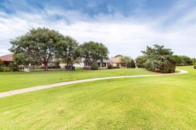 Welcome to this stunning stucco and stone Trova, beautifully on Wildhorse Golf Club of Robson Ranch in Texas - for sale on GolfHomes.com, golf home, golf lot