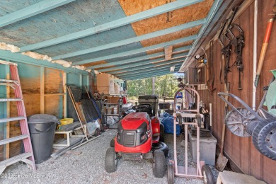 This meticulously maintained 3-bedroom, 2-bath ranch sits on a on The Lakes Country Club in North Carolina - for sale on GolfHomes.com, golf home, golf lot