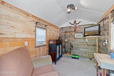 This meticulously maintained 3-bedroom, 2-bath ranch sits on a on The Lakes Country Club in North Carolina - for sale on GolfHomes.com, golf home, golf lot