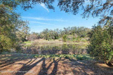 Discover the essence of Florida living in this charming on Oak Hills Country Club in Florida - for sale on GolfHomes.com, golf home, golf lot