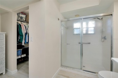 This recently renovated 2nd level end unit residence is light on Plantation Golf and Country Club in Florida - for sale on GolfHomes.com, golf home, golf lot