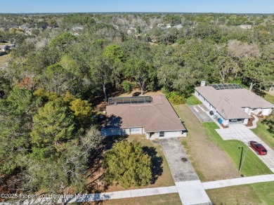 Discover the essence of Florida living in this charming on Oak Hills Country Club in Florida - for sale on GolfHomes.com, golf home, golf lot