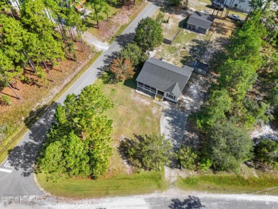 This meticulously maintained 3-bedroom, 2-bath ranch sits on a on The Lakes Country Club in North Carolina - for sale on GolfHomes.com, golf home, golf lot