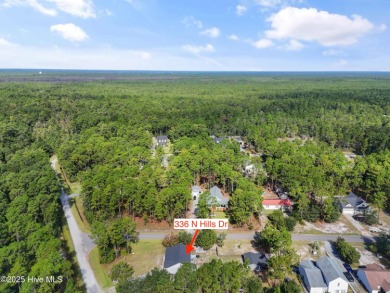 This meticulously maintained 3-bedroom, 2-bath ranch sits on a on The Lakes Country Club in North Carolina - for sale on GolfHomes.com, golf home, golf lot