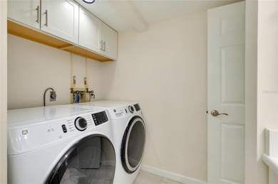 This recently renovated 2nd level end unit residence is light on Plantation Golf and Country Club in Florida - for sale on GolfHomes.com, golf home, golf lot