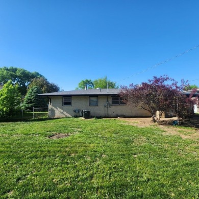Discover comfort and convenience in this charming brick ranch on Hillcrest Golf and Country Club in South Dakota - for sale on GolfHomes.com, golf home, golf lot