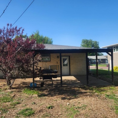 Discover comfort and convenience in this charming brick ranch on Hillcrest Golf and Country Club in South Dakota - for sale on GolfHomes.com, golf home, golf lot