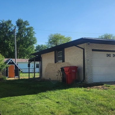 Discover comfort and convenience in this charming brick ranch on Hillcrest Golf and Country Club in South Dakota - for sale on GolfHomes.com, golf home, golf lot