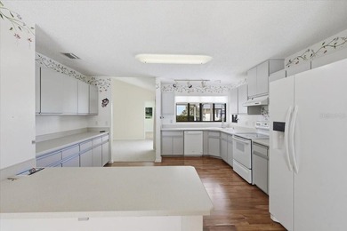 Hurry and grab this spectacular pool home offering over 2,000 on The Grand Club - Pine Lakes Course in Florida - for sale on GolfHomes.com, golf home, golf lot