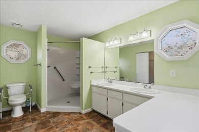 Hurry and grab this spectacular pool home offering over 2,000 on The Grand Club - Pine Lakes Course in Florida - for sale on GolfHomes.com, golf home, golf lot