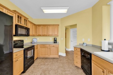 This top-floor, 4 bedroom, 3 bath condo in Edgewater at Barefoot on Barefoot Resort and Golf Club  in South Carolina - for sale on GolfHomes.com, golf home, golf lot