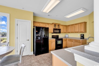 This top-floor, 4 bedroom, 3 bath condo in Edgewater at Barefoot on Barefoot Resort and Golf Club  in South Carolina - for sale on GolfHomes.com, golf home, golf lot