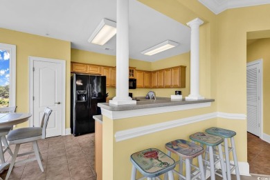 This top-floor, 4 bedroom, 3 bath condo in Edgewater at Barefoot on Barefoot Resort and Golf Club  in South Carolina - for sale on GolfHomes.com, golf home, golf lot