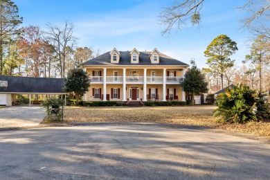 Welcome to 32 Cockadoodle Loop, a stunning estate on the River on Pawpaw Country Club in South Carolina - for sale on GolfHomes.com, golf home, golf lot