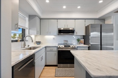 **PRICE IMPROVEMENT WITH BONUS FURNITURE!** This COASTAL CHIC on Capri Isle Golf Club in Florida - for sale on GolfHomes.com, golf home, golf lot