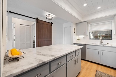 **PRICE IMPROVEMENT WITH BONUS FURNITURE!** This COASTAL CHIC on Capri Isle Golf Club in Florida - for sale on GolfHomes.com, golf home, golf lot