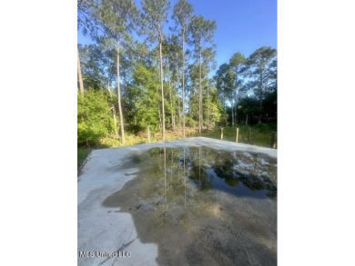 Lovely large lot on quiet cut-de-sac in Diamondhead. Slab in on Diamondhead Country Club in Mississippi - for sale on GolfHomes.com, golf home, golf lot