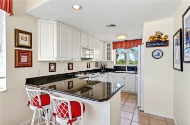 Rarely available three-bedroom penthouse with stunning views of on Grand Harbor Golf and Country Club in Florida - for sale on GolfHomes.com, golf home, golf lot