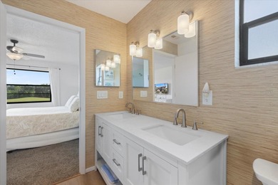 **PRICE IMPROVEMENT WITH BONUS FURNITURE!** This COASTAL CHIC on Capri Isle Golf Club in Florida - for sale on GolfHomes.com, golf home, golf lot