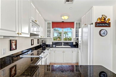 Rarely available three-bedroom penthouse with stunning views of on Grand Harbor Golf and Country Club in Florida - for sale on GolfHomes.com, golf home, golf lot