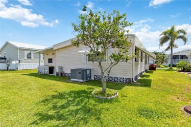 Welcome to a refined slice of paradise in the prestigious on Twin Isles Country Club in Florida - for sale on GolfHomes.com, golf home, golf lot