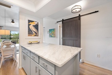 **PRICE IMPROVEMENT WITH BONUS FURNITURE!** This COASTAL CHIC on Capri Isle Golf Club in Florida - for sale on GolfHomes.com, golf home, golf lot