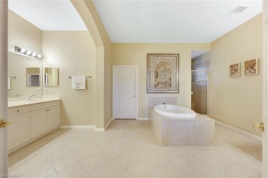 Stunning Designer Condo with Expansive Lake Views in the Heart on Pelican Sound Golf and River Club in Florida - for sale on GolfHomes.com, golf home, golf lot