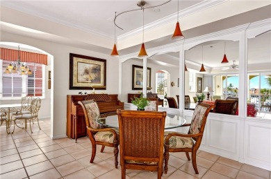 Rarely available three-bedroom penthouse with stunning views of on Grand Harbor Golf and Country Club in Florida - for sale on GolfHomes.com, golf home, golf lot