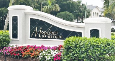 Stunning Designer Condo with Expansive Lake Views in the Heart on Pelican Sound Golf and River Club in Florida - for sale on GolfHomes.com, golf home, golf lot