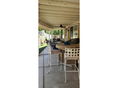 Pour yourself your favorite beverage and set back and enjoy the on Sun Lakes Country Club in California - for sale on GolfHomes.com, golf home, golf lot