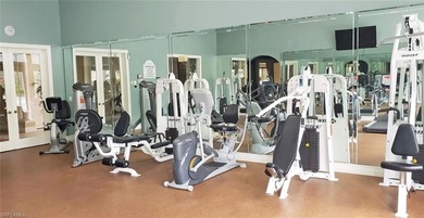 Stunning Designer Condo with Expansive Lake Views in the Heart on Pelican Sound Golf and River Club in Florida - for sale on GolfHomes.com, golf home, golf lot